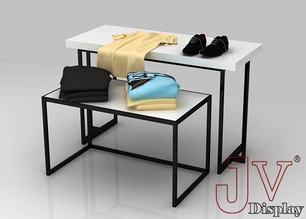 white clothing display tables