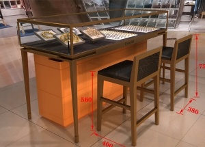 new design jewellery showcase with chairs